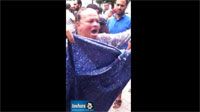 شقيقة محمد علي السنوسي في مظاهرة لمناهضة التعذيب أمام وزارة الداخلية 