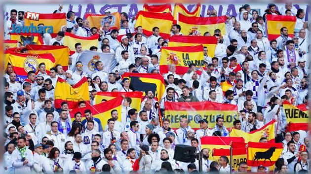 جماهير الريال ترفع العلم الإسباني في وجه لاعبي برشلونة
