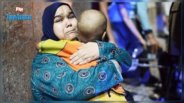 لحظة تفجير القاهرة : حكاية الأم المصرية التي هزّت صورتها مع طفلها العالم