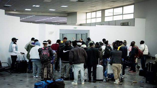 عودة 97 مهاجرا من تونس إلى غينيا