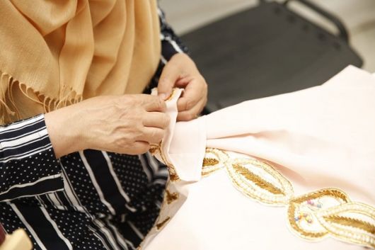 وزارة الاسرة تنظم معرضا لمنتوجات