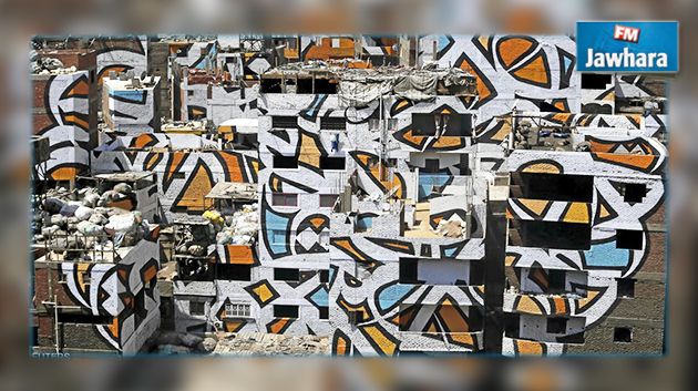 رسام تونسي يحوّل منطقة قمامة إلى لوحة فنية