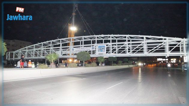 تركيز منشأة علوية حديدية للمترجلين على مستوى الطريق الوطنية 09