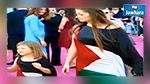 ألمانية وابنتها تتجولان في شوارع ألمانيا مرتديتان العلم الفلسطيني