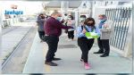 Distribution de masques de protection dans les stations de la Transtu